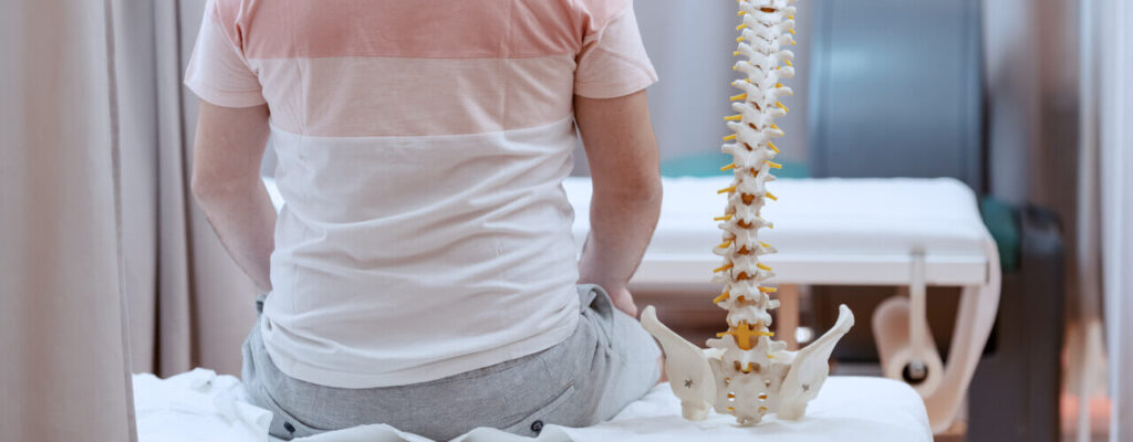 A man with spinal back pain